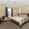 Foto: Grewals Inn and Suites by Elevate Rooms 15/61