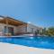 Niova Villa - Seafront, private pool and Ionian Sea Views, by ZanteWize - Alykés
