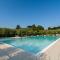 Apartment on Lake Garda with pebble beach pier for boat three swimming pools