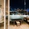 Foto: Viaduct Harbour Waterfront Luxury Apt+ Pool Spa Sauna & Gym 4/47