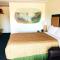 Foto: 7 Days Inn Niagara Falls by Elevate Rooms 16/18