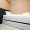 Luxurious 2BR Bassura City Apartment with Mall Access By Travelio