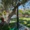 Olive Garden Holiday Home steps to Beach 2
