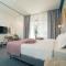 Foto: City Nest Modern & Cozy Suites 38/51