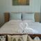 Grand Blue Condominium by Mary