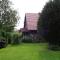 Ferienhaus Eulenhaus im urigen Garten