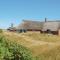 Foto: Seven-Bedroom Holiday Home in Harboore 1/26