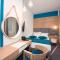 Foto: City Nest Modern & Cozy Suites 5/51