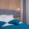 Foto: City Nest Modern & Cozy Suites 4/51