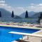 Appartamento vista lago Le Terrazze piscina-tennis-parking