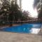Pool View 2BR Mutiara Bekasi Apartment By Travelio