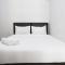 2BR with Sofa Bed The Springlake Summarecon Bekasi Apartment By Travelio