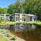 Foto: Modern chalet with a dishwasher, near a pond