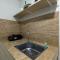 2BR with Sofa Bed The Springlake Summarecon Bekasi Apartment By Travelio