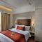 Mahagun Sarovar Portico Suites