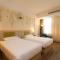 Foto: IBIS Styles Nantong Development Zone Shimao Plaza 6/49