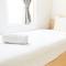 Simply Minimalist 2BR The Springlake Summarecon Apartment By Travelio