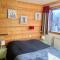Duplex skis aux pieds Belle Plagne