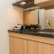 Minimalist 2BR Apartment at Parahyangan Residence By Travelio
