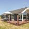 Foto: Three-Bedroom Holiday Home in Jerup