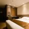 Foto: GreenTree Inn Seogwipo Express Hotel 19/37