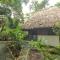 Cohune Palms River Cabanas