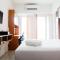 Strategic Studio Apartment at Orchard Mansion Supermall By Travelio
