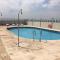 Pisos con piscina de temporada corta estancia