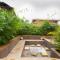 SaffronStays Dhyana - 3BR pet-friendly pool villa with Wi-Fi, indoor games and riverside trails in Wadas gated estate