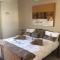 African Palm Cottage and Guesthouse - Durbanville