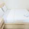 Comfort and Cozy 2BR Apartment Parahyangan Residence By Travelio
