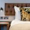 The Cheshire Cat by Innkeepers Collection