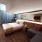 Iconic Suites & Pods Hotel