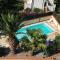 Villa del Golfo Urio with swimming pool shared by the two apartments