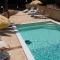 Villa del Golfo Urio with swimming pool shared by the two apartments