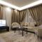 Foto: Kanz Al Jawdah Hotel Suites - كنز الجودة للأجنحة الفندقية 18/31