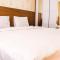 Cozy and Elegant 1BR Apartment Belmont Residence Puri By Travelio