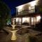 VILLA ALICIA with priv pool, beautiful garden and shady veranda- 5 min to the beach