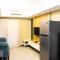 Amazing 2BR with City View The Wave Kuningan Apartment By Travelio