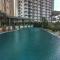 Minimalist Studio The Oasis Apartment near Omni Hospital Cikarang By Travelio