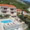 Seaside apartments with a swimming pool Marusici, Omis - 10009