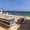 Foto: 3b Beachfront Large Pool Penthouse-Apollonia beach 31/52