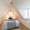 Foto: Three-Bedroom Holiday Home in Svaneke 10/23