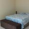 Praia com Conforto - غواراتوبا
