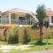 Praia com Conforto - غواراتوبا