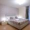 State of the art home suite with 180 degree panoramic lake view, pool and spa sleeping up to 10 guests by Italian Apartments - Como