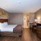 Guest Inn & Suites - Midtown Medical Center