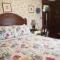 Foto: Colonial Charm Inn Bed & Breakfast 43/81