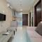 Cozy 1BR Brooklyn Alam Sutera Apartment By Travelio