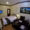 The Executive Villa Inn & Suites